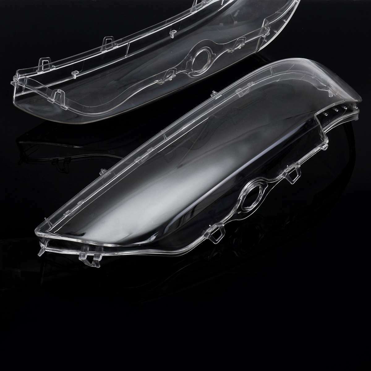 A pair of headlight lenses and headlight covers suitable for 1996-2003 for BMW E39 models, including the 525i, 528i, and 530i.