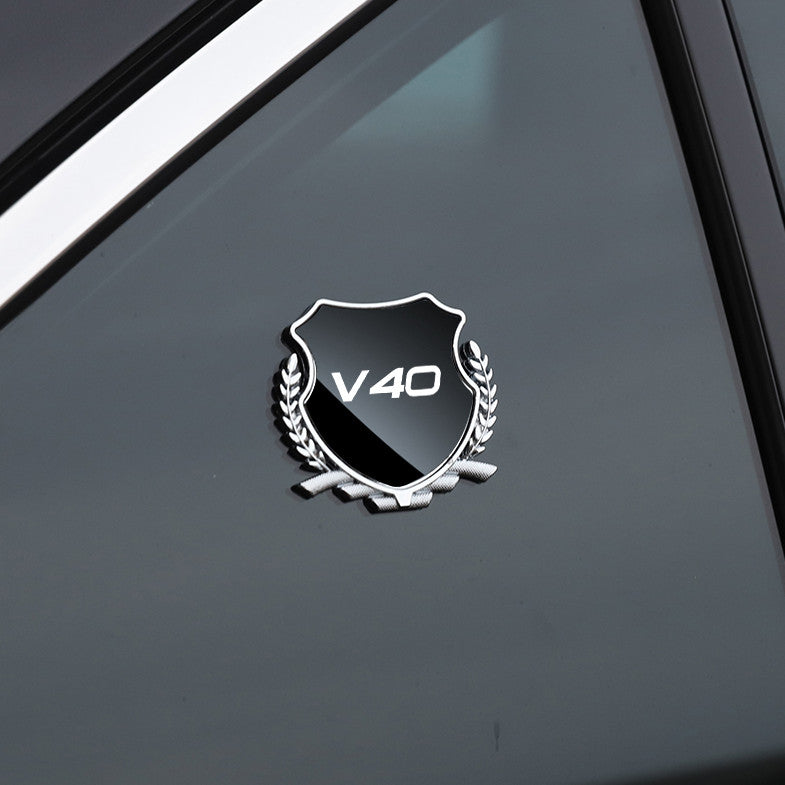 Black side fender and window badge decals for Volvo XC70 cars.