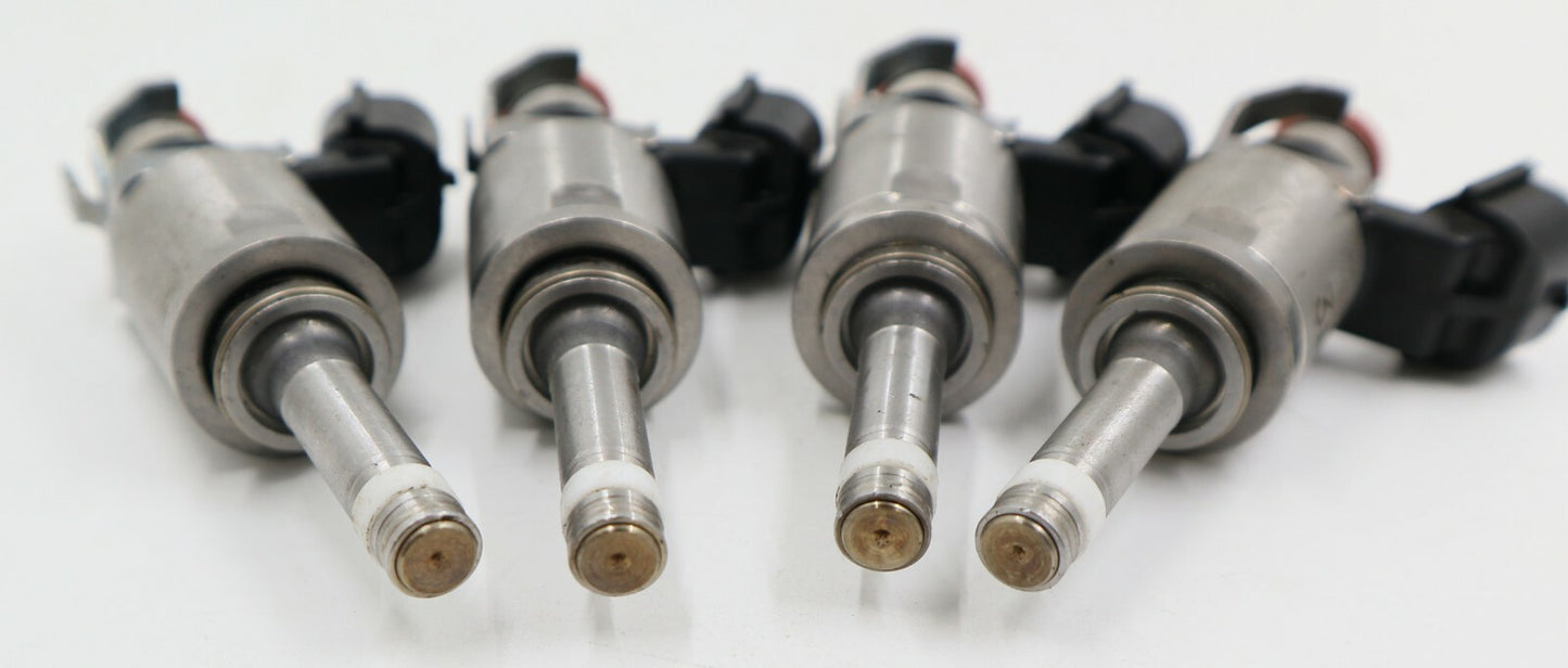 4-pack of new fuel injectors for Ford and for Mazda P501-13-250A.