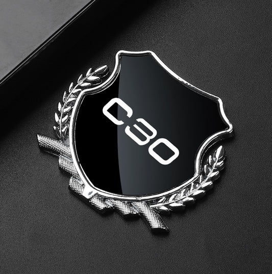 Black side fender and window badge decals for Volvo S40 cars.
