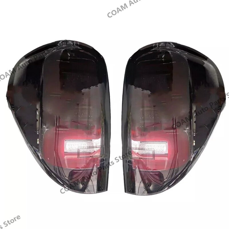 A pair of LED taillights and brake lights for Mitsubishi L200 Triton 2005-2014 (smoked)