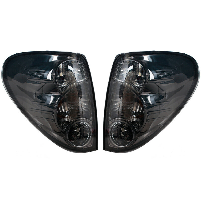 A pair of Triton Colt pickups for Mitsubishi L200 2005-2016 taillights and rear brake lights.