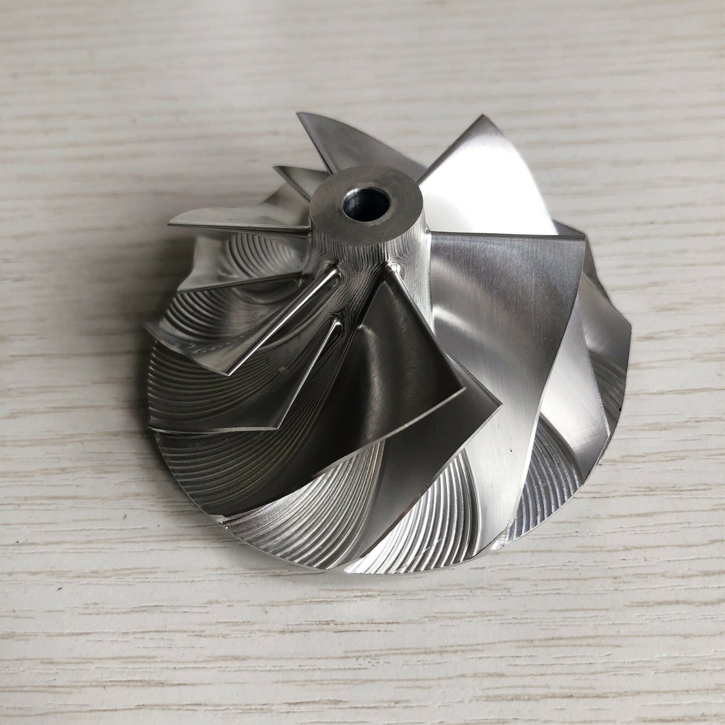 GT3037 Reverse 6+6 Blade 57.04/76.13 mm Bore: 5.99 mm Billet Compressor Wheel