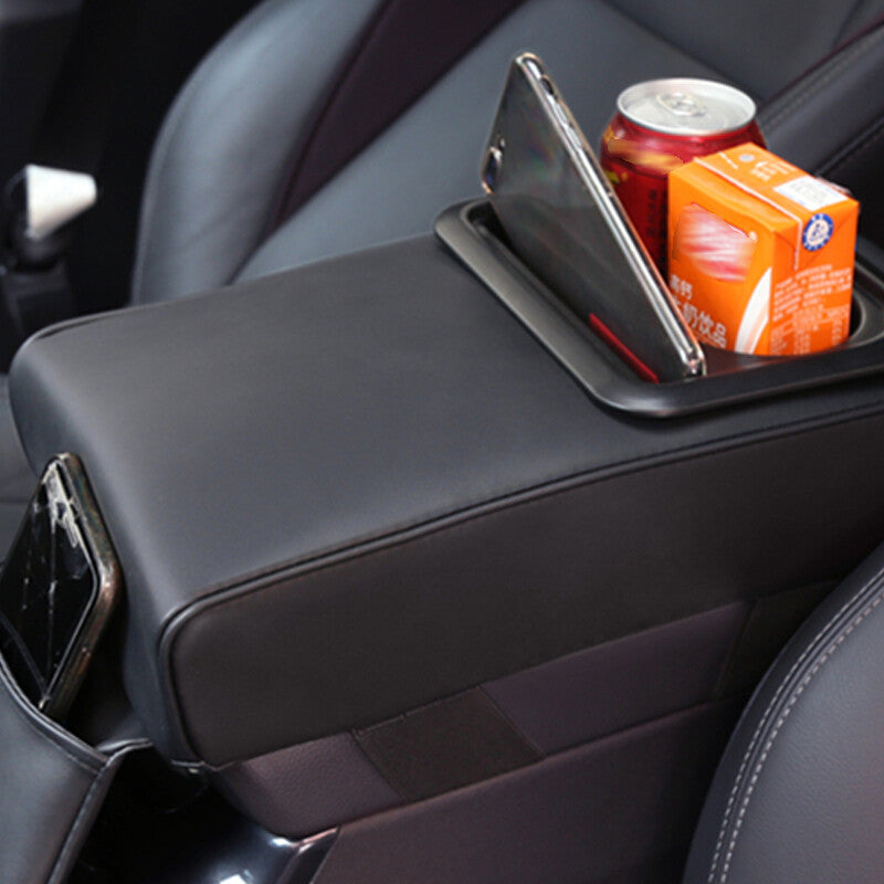 Black car armrest with elbow support, backrest cushion, cup holder, and storage ( )