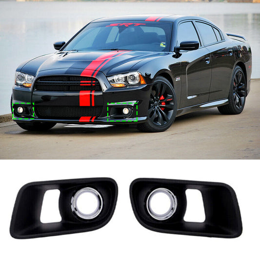 A pair of front bumper fog light covers for Dodge chargers from around 2012-2014.