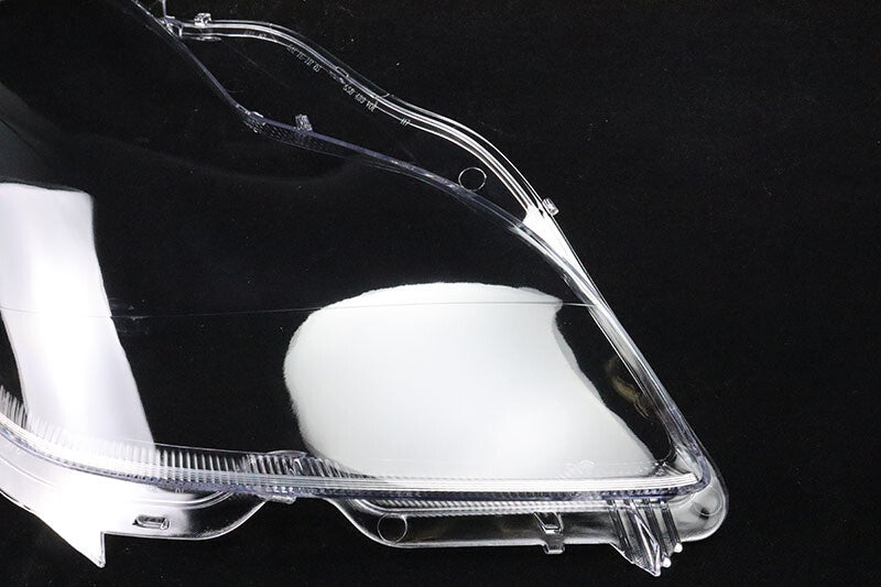A pair of transparent headlight protective covers for Mercedes-Benz W219, CLS350, and CLS550 (2006-2011).