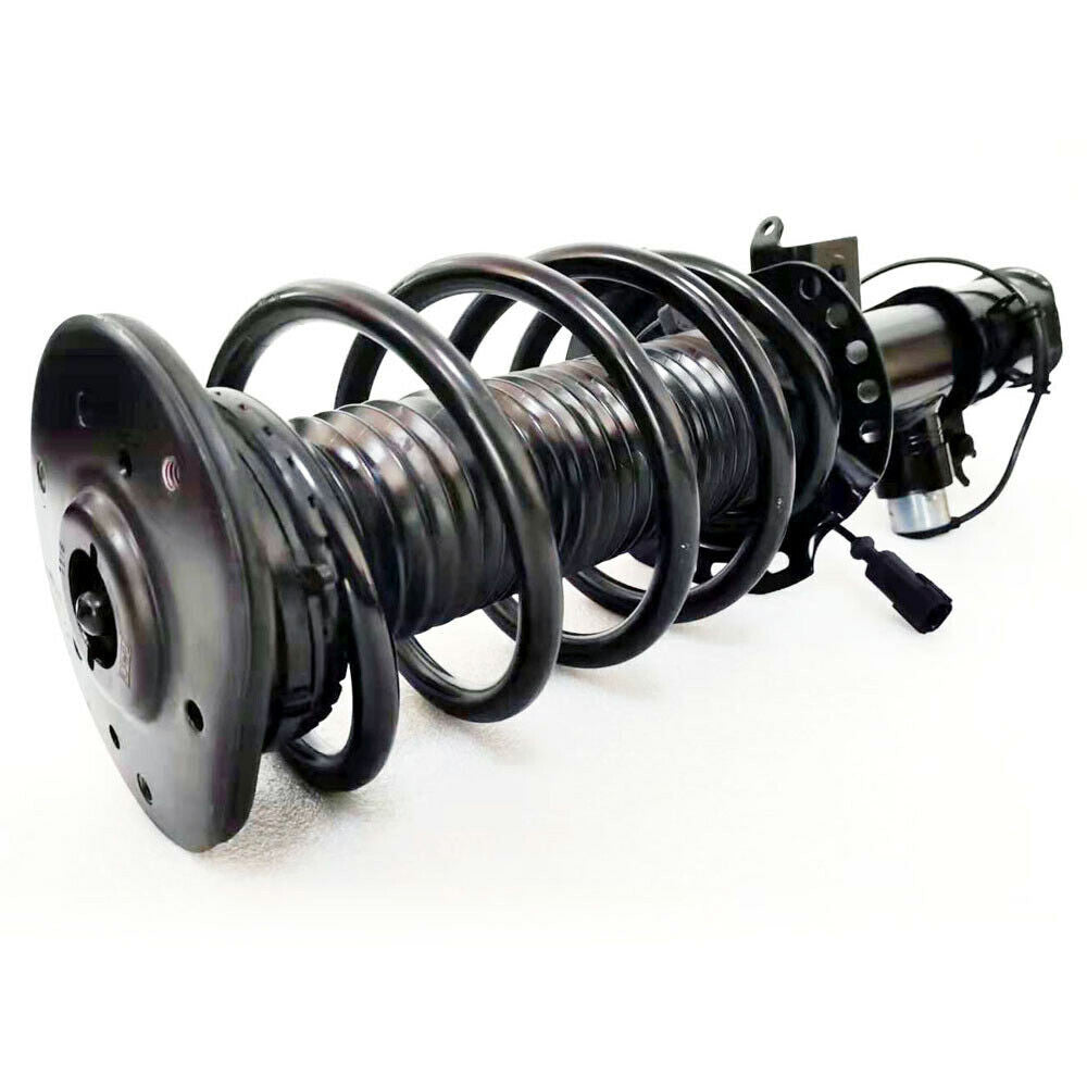 A pair of front shock absorber coil spring struts with electric adjustment for Lincoln 2017 - 2020.