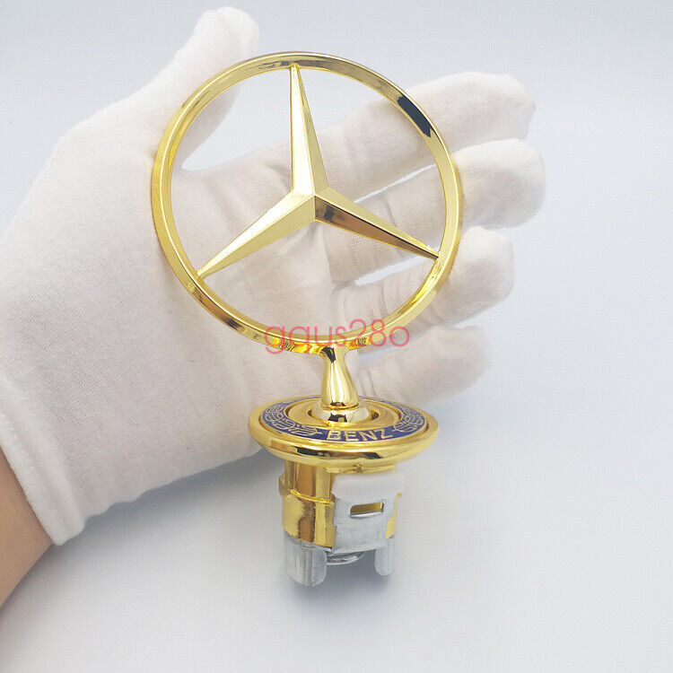 new gold star-patterned 3D range hood logo badges for W210, W202, W203, C200, and W211.