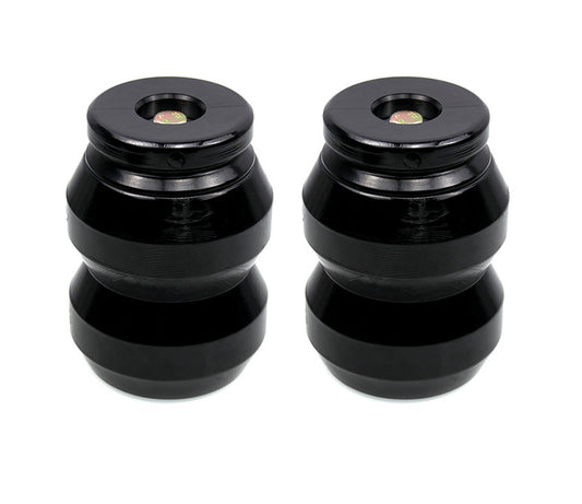 Rear suspension reinforcement system for Ram 1500 2009-2021 with rubber anti-collision stops.