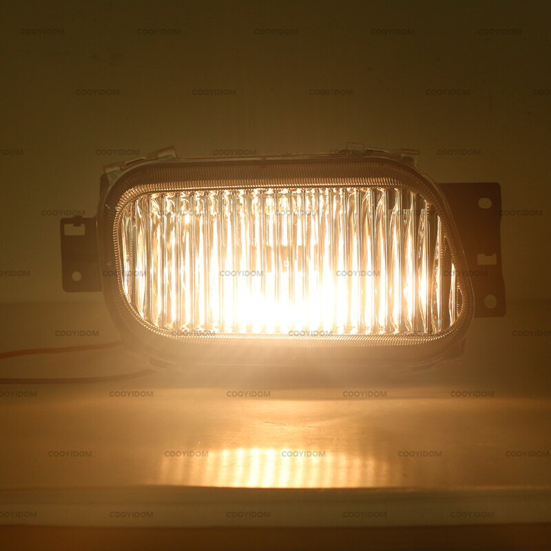 A pair of front bumper fog lights with bulbs for Mitsubishi Canter FUSO FE 7/8 2005-11