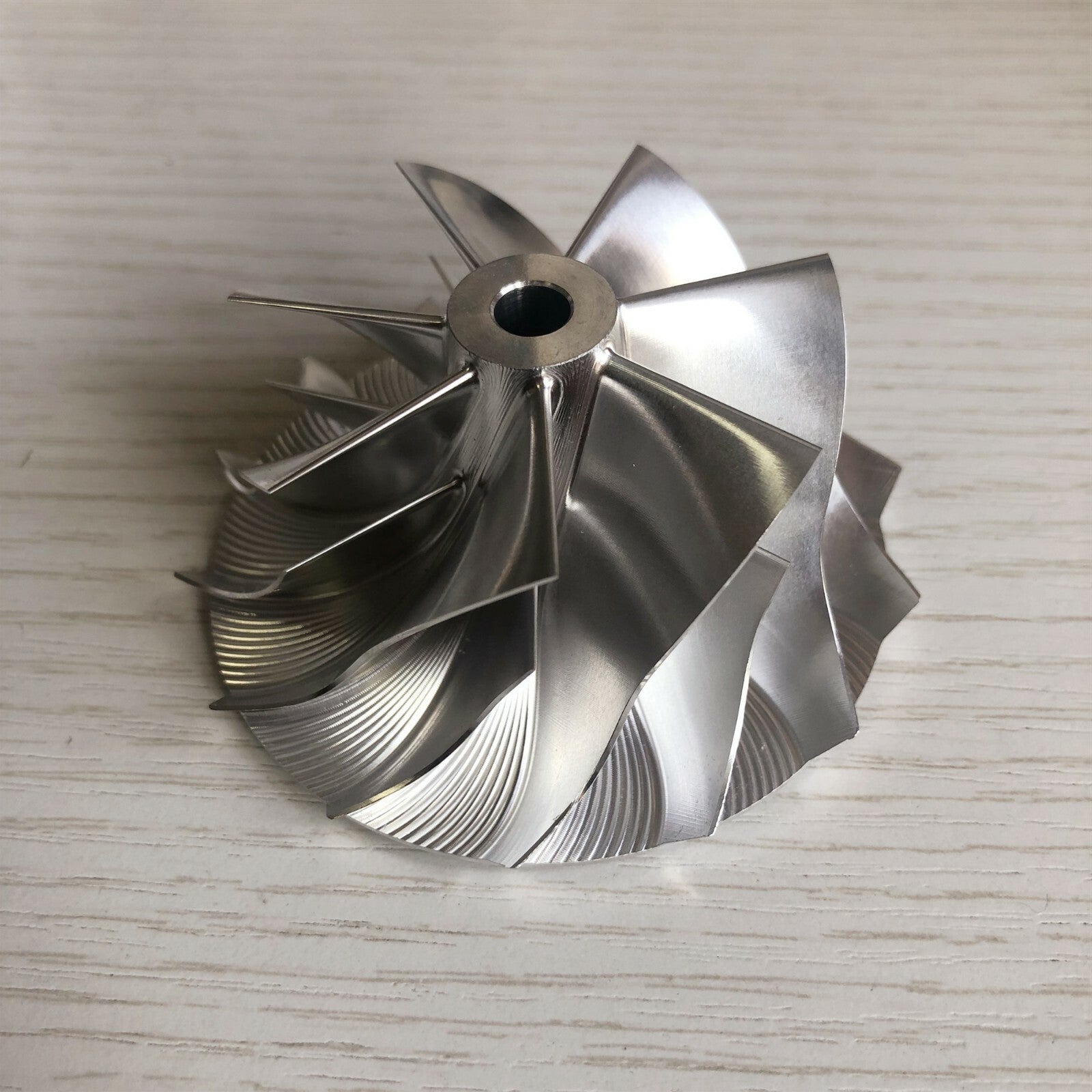TD05H Reverse 54.56/70.01 mm 7+7 Blade Performance Billet Compressor Wheel