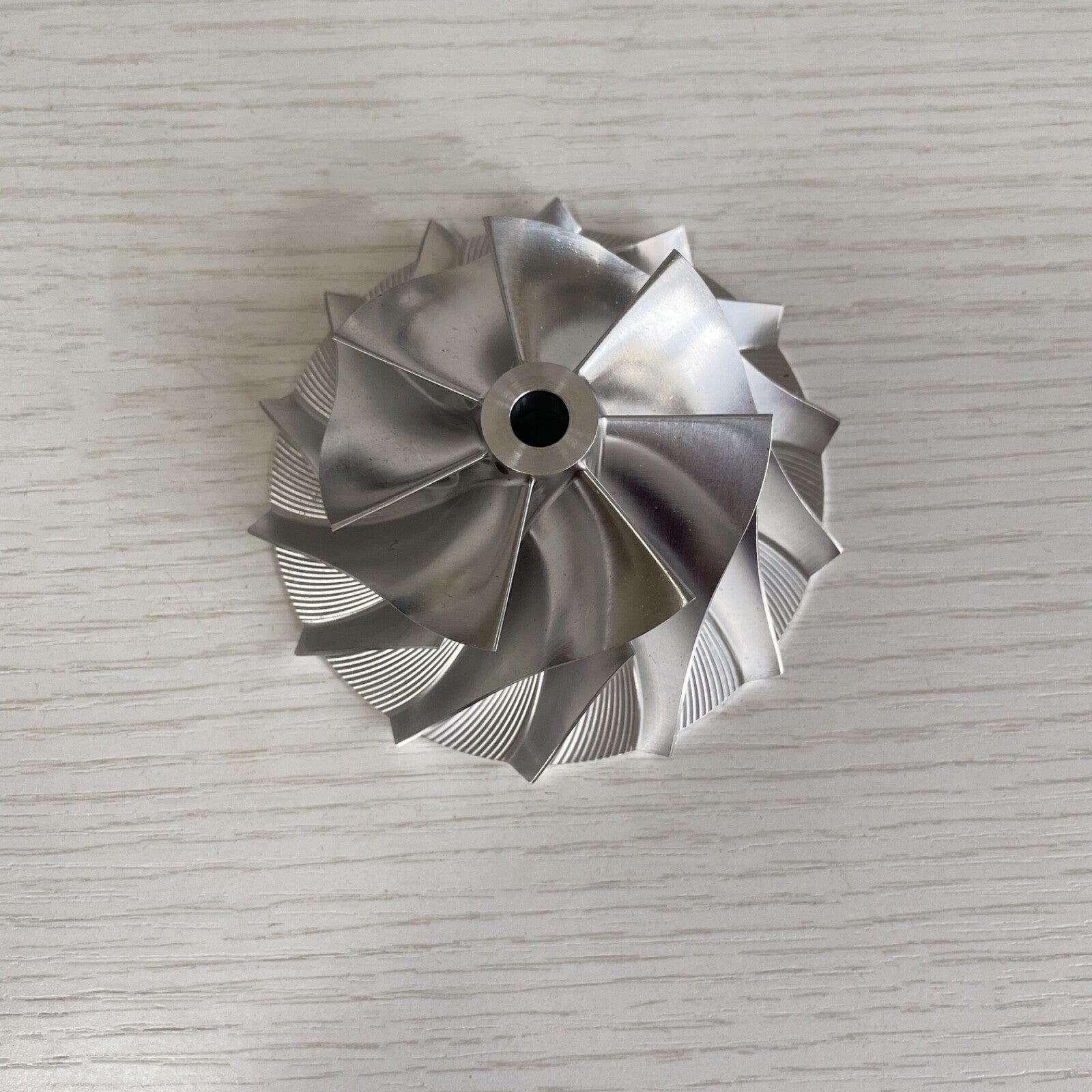 Custom reverse 59.87/86.01 mm 7+7 blade high-performance billet compressor wheel