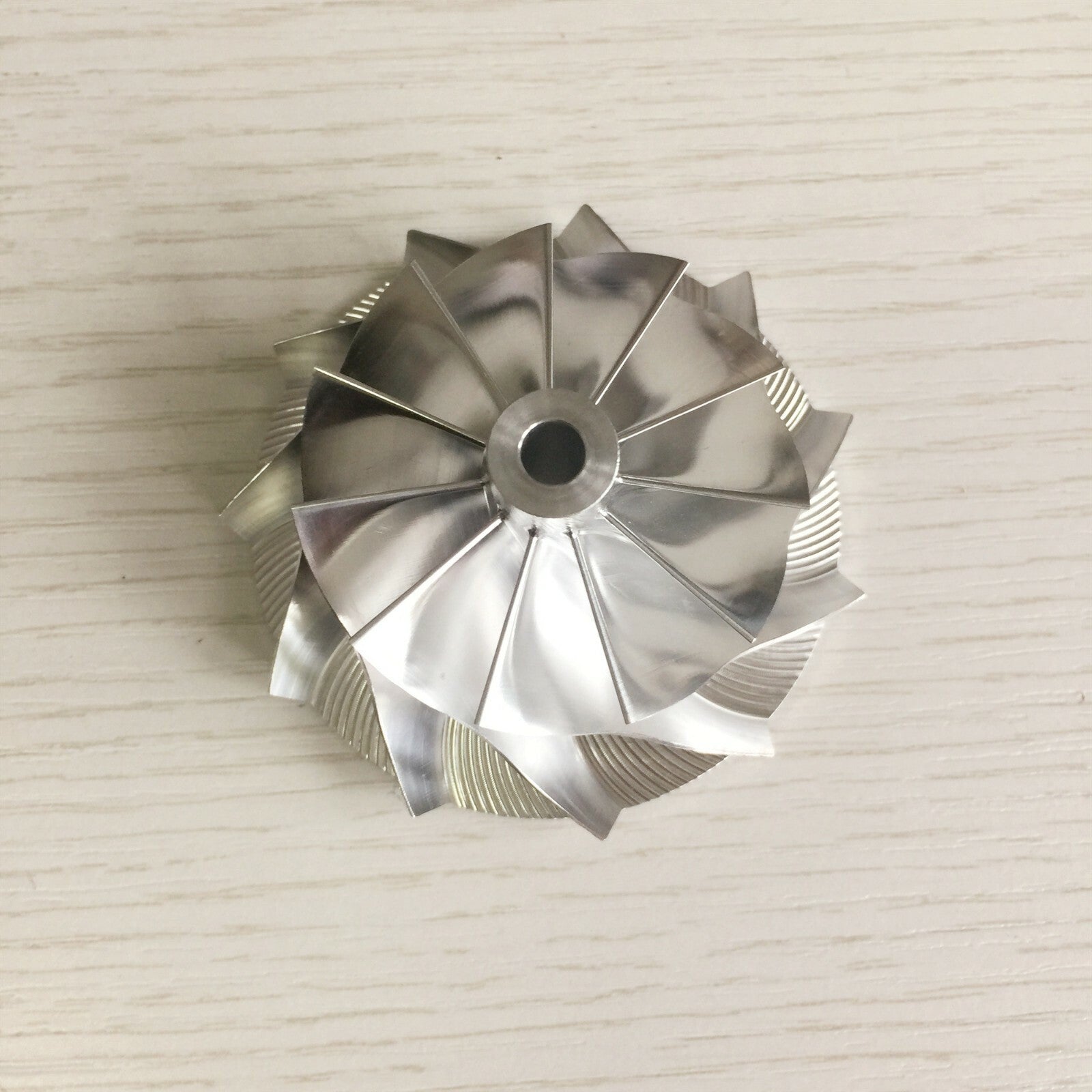CT26 48.30/64.89 mm 11+0 Blade Turbine Milling/Blank Compressor Wheel