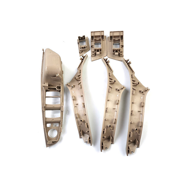 One set of beige and white interior door handle panels suitable for BMW F10, F11, 520i, 525d, 535i, and 550i.